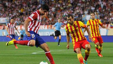 أتلتيكو مدريد يتربص ببرشلونة في قمة مبكرة بالدوري الأسباني